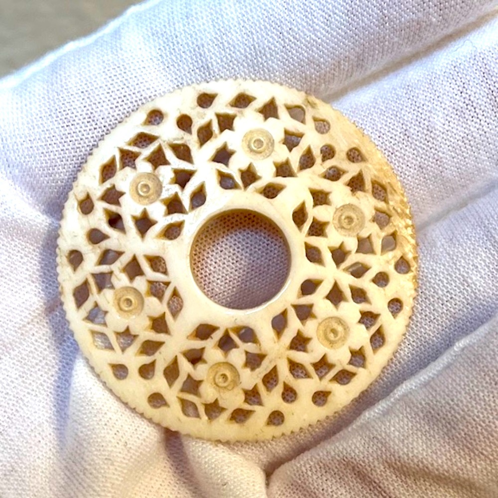 Carved Disc. Intricate Pattern. Natural Material, Horn. Accessory. Like a B-Disc
